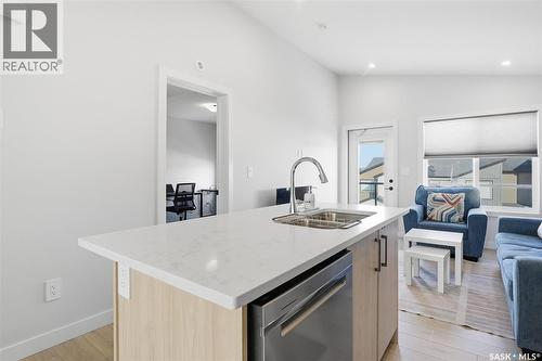 30 651 Dubois Crescent, Saskatoon, SK - Indoor Photo Showing Kitchen With Double Sink