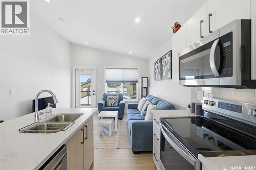 30 651 Dubois Crescent, Saskatoon, SK - Indoor Photo Showing Kitchen With Double Sink With Upgraded Kitchen