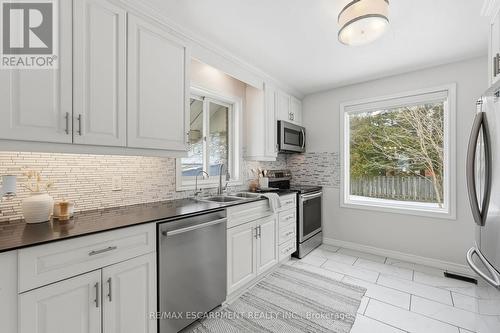 15 Mulock Avenue, Hamilton, ON - Indoor Photo Showing Kitchen With Double Sink With Upgraded Kitchen