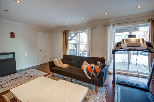 Salle familiale - 51 Rue Desbarats, Kirkland, QC - Indoor Photo Showing Living Room With Fireplace