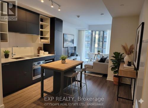Virtually staged kitchen adn living room - 607 - 20 Edward Street, Toronto, ON - Indoor