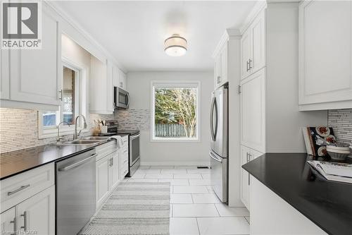 15 Mulock Avenue, Hamilton, ON - Indoor Photo Showing Kitchen With Double Sink With Upgraded Kitchen