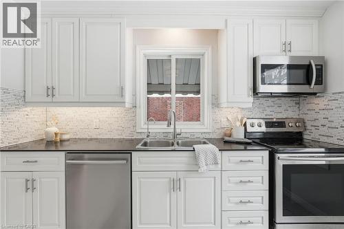 15 Mulock Avenue, Hamilton, ON - Indoor Photo Showing Kitchen With Double Sink With Upgraded Kitchen