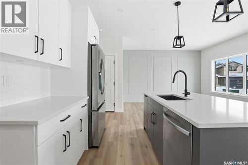 211 Sharma Lane, Saskatoon, SK - Indoor Photo Showing Kitchen With Upgraded Kitchen