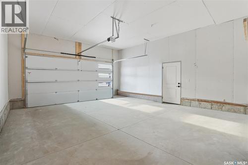 211 Sharma Lane, Saskatoon, SK - Indoor Photo Showing Garage