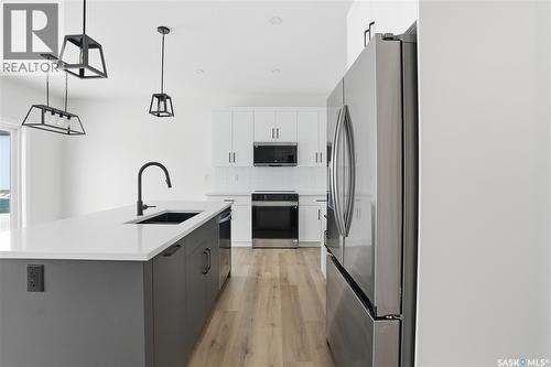 211 Sharma Lane, Saskatoon, SK - Indoor Photo Showing Kitchen With Upgraded Kitchen
