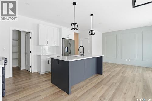 211 Sharma Lane, Saskatoon, SK - Indoor Photo Showing Kitchen With Upgraded Kitchen