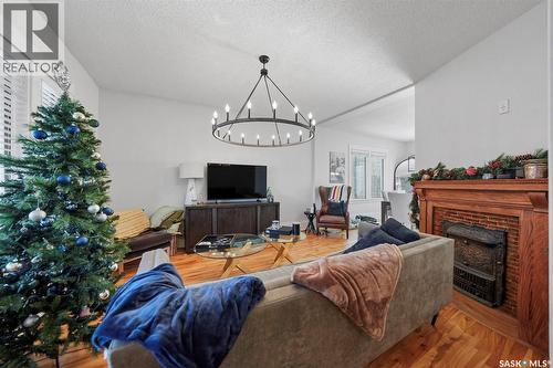 106 8Th Street E, Saskatoon, SK - Indoor Photo Showing Living Room With Fireplace