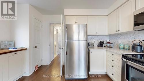In Between Privacy Door - 32 Zezel Way, Toronto, ON - Indoor Photo Showing Kitchen