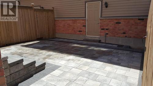 Professionally Interlocked backyard - 32 Zezel Way, Toronto, ON -  With Exterior