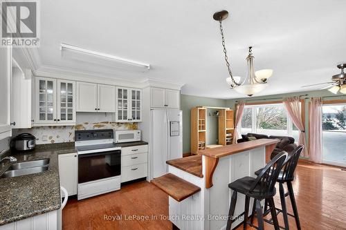 Breakfast Bar - 1 Logmoss Road, Tiny, ON - Indoor Photo Showing Kitchen With Double Sink