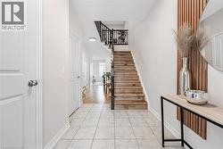 Living room with hardwood / wood-style floors and recessed lighting - 