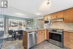 NEWER GAS RANGE AND DISHWASHER - 