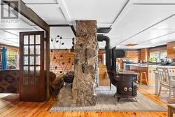 Stone Wall separating Kitchen and Living Room - 