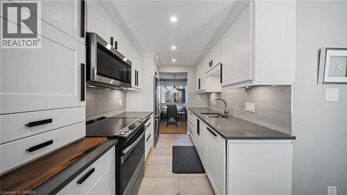 23 Freeman Crescent, Simcoe, ON - Indoor Photo Showing Kitchen With Double Sink With Upgraded Kitchen