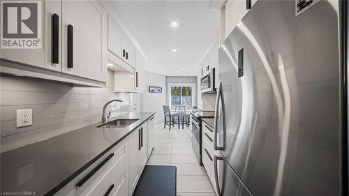 23 Freeman Crescent, Simcoe, ON - Indoor Photo Showing Kitchen With Double Sink With Upgraded Kitchen