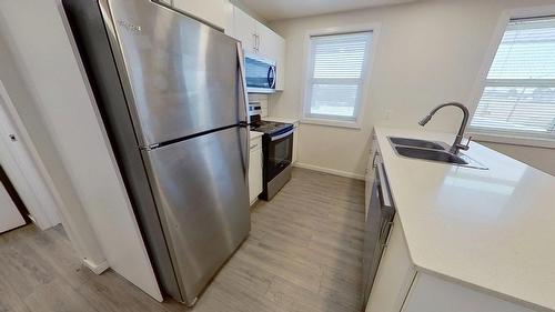 4816  52 Street, Wetaskiwin, AB - Indoor Photo Showing Kitchen With Double Sink