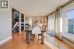 Dining room with light hardwood / wood-style floors - 