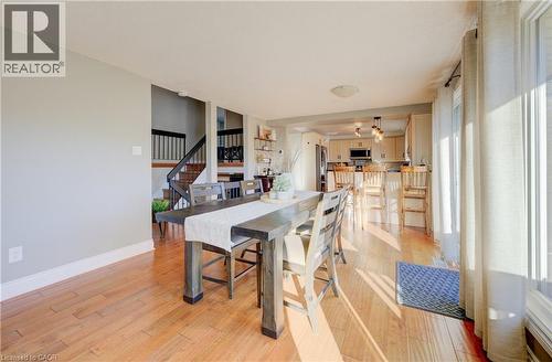 Dining room with ceiling fan and light hardwood / wood-style flooring - 47 Manor Drive, Kitchener, ON - Indoor Photo Showing Dining Room