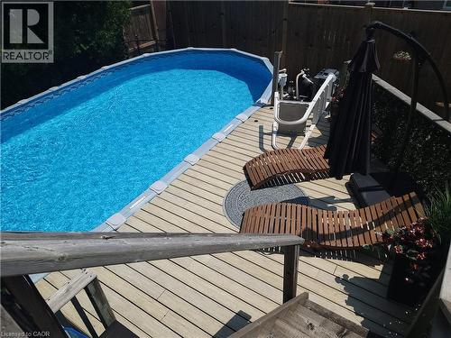 47 Manor Drive, Kitchener, ON - Outdoor With Above Ground Pool With Deck Patio Veranda