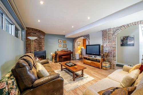 Family room - 30 Rue Gauthier, Dollard-Des-Ormeaux, QC - Indoor Photo Showing Living Room With Fireplace