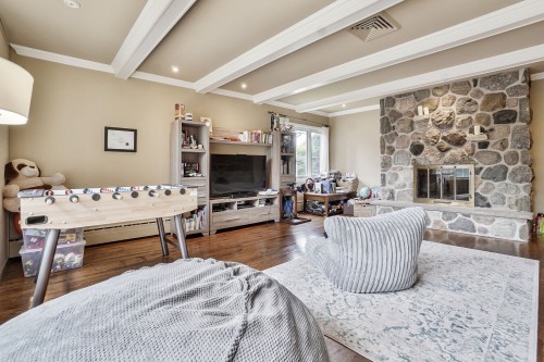 Salle familiale - 425 Av. Lockhart, Mont-Royal, QC - Indoor Photo Showing Living Room With Fireplace