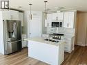 111 Stromberg Crescent, Saskatoon, SK  - Indoor Photo Showing Kitchen With Double Sink With Upgraded Kitchen 