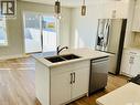 111 Stromberg Crescent, Saskatoon, SK  - Indoor Photo Showing Kitchen With Double Sink 