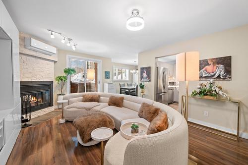Vue d'ensemble - 107-7 Rue St-Léandre, Saint-Jérôme, QC - Indoor Photo Showing Living Room With Fireplace