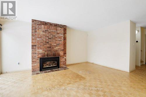 60 - 121 Buell Street, Ottawa, ON - Indoor Photo Showing Living Room With Fireplace