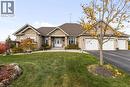 Craftsman-style house with stone exterior, triple wide driveway, manicured yard, and an oversized 3 car garage - 10 Brolley Crescent, Thornton, ON  - Outdoor With Facade 