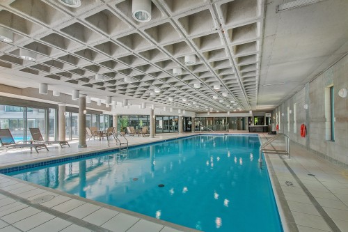 Pool - 103-4450 Prom. Paton, Laval (Chomedey), QC - Indoor Photo Showing Other Room With In Ground Pool