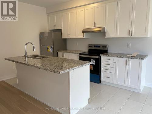 36 John Canning Way E, Markham, ON - Indoor Photo Showing Kitchen With Double Sink