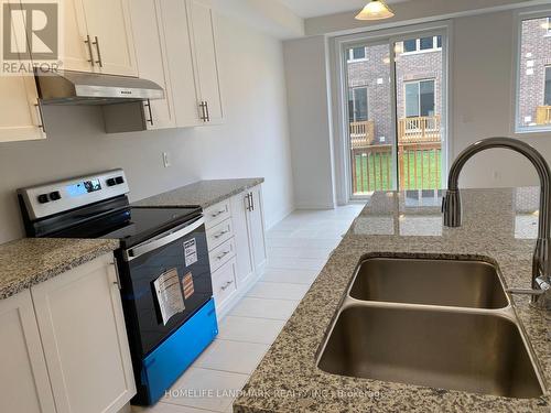 36 John Canning Way E, Markham, ON - Indoor Photo Showing Kitchen With Double Sink