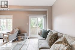 Living room with Walk-out to large tiered Deck - 