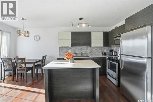 106 410 Ledingham Way, Saskatoon, SK - Indoor Photo Showing Kitchen With Stainless Steel Kitchen With Upgraded Kitchen
