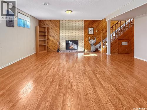 372 Hayes Drive, Swift Current, SK - Indoor Photo Showing Other Room With Fireplace