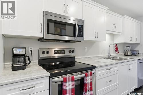 3101 106 Willis Crescent, Saskatoon, SK - Indoor Photo Showing Kitchen With Double Sink