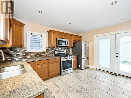 180 Rosslyn Avenue N, Hamilton, ON - Indoor Photo Showing Kitchen With Stainless Steel Kitchen With Double Sink