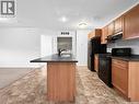 36 1275 Railway Street, Swift Current, SK  - Indoor Photo Showing Kitchen 