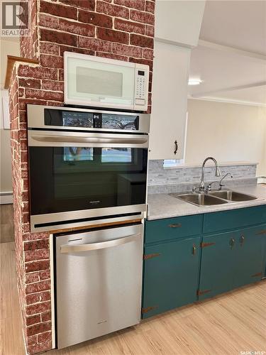 133 Railway Avenue, Ponteix, SK - Indoor Photo Showing Kitchen With Double Sink