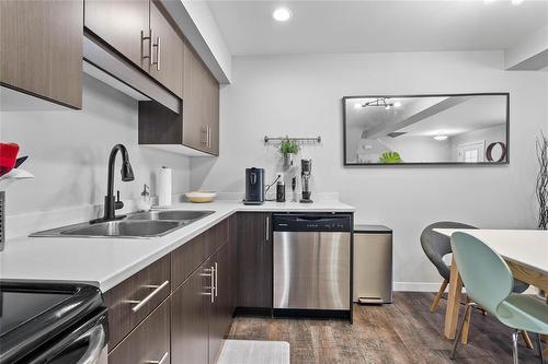 807 280 Amber Trail, Winnipeg, MB - Indoor Photo Showing Kitchen With Double Sink