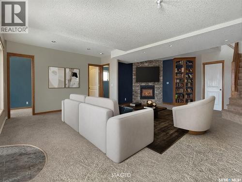 The Landing Acreage, Saskatchewan Landing, SK - Indoor Photo Showing Other Room With Fireplace