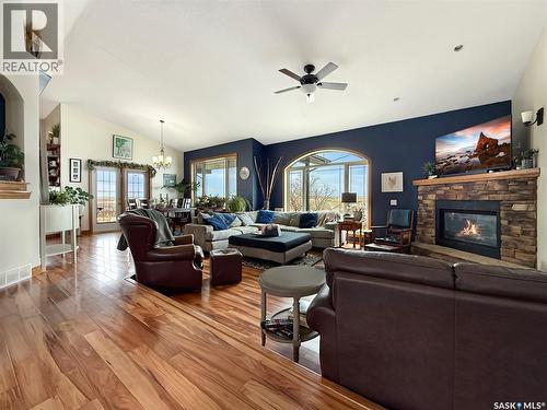 The Landing Acreage, Saskatchewan Landing, SK - Indoor Photo Showing Living Room With Fireplace