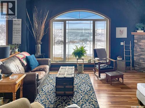 The Landing Acreage, Saskatchewan Landing, SK - Indoor Photo Showing Living Room With Fireplace