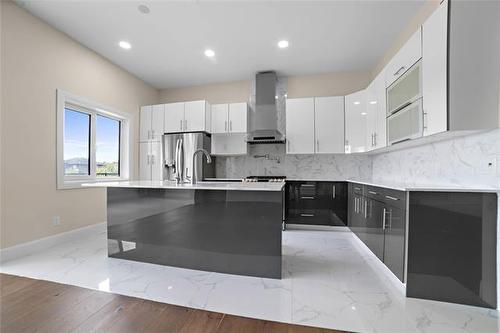 4 Discovery Cove, Headingley, MB 