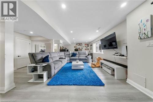 Living room with light wood-type flooring and recessed lighting - 59 Greti Drive, Hamilton, ON - Indoor