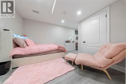 Bedroom featuring recessed lighting and wood finished floors - 