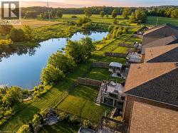 Aerial view of a large body of water and a tree filled landscape - 