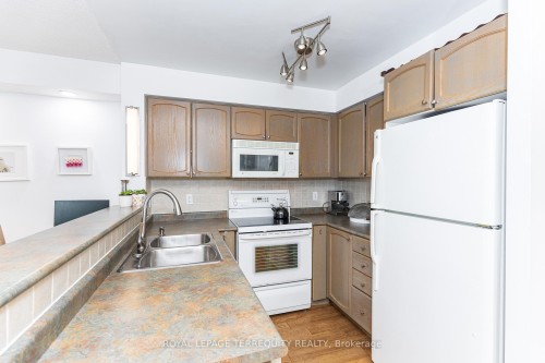 1005-15 Michael Power Place, Toronto, ON - Indoor Photo Showing Kitchen With Double Sink